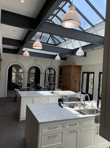 Pendant lighting over a luxury kitchen island