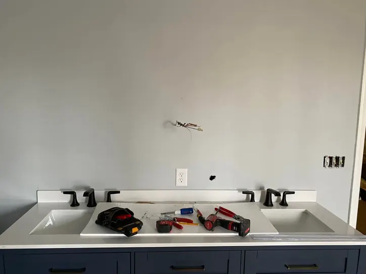 Burnt electrical outlet repaired by Monday Electric